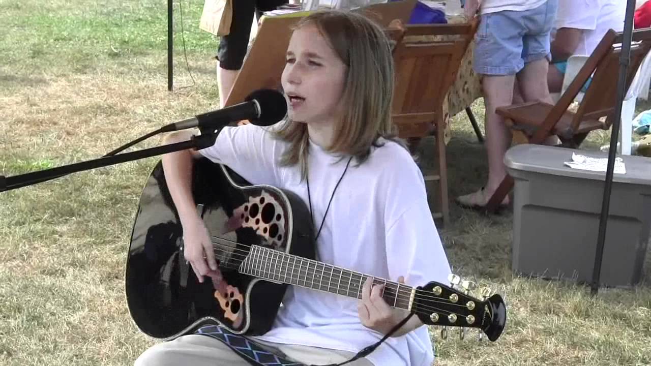 Sawyer at the Greenfield Farmers Market with a New Original Song, 