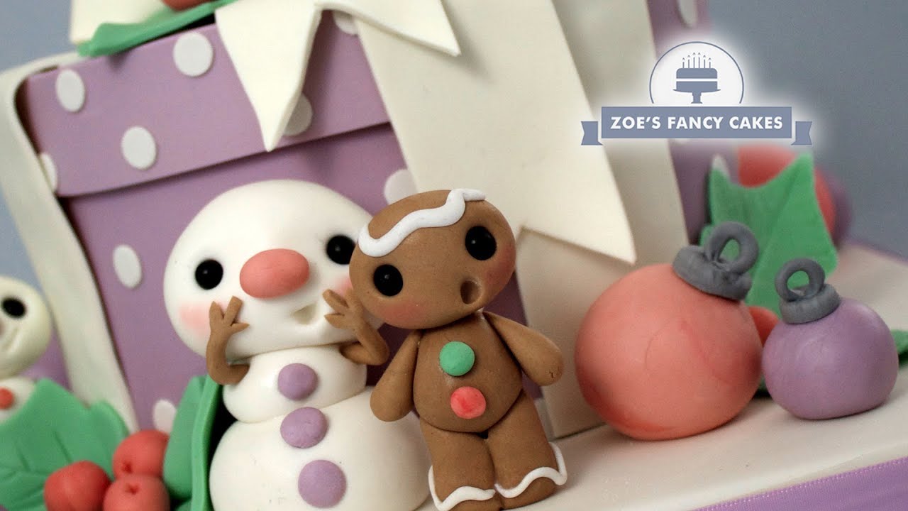 Christmas gift cake with snowmen & gingerbread men toppers