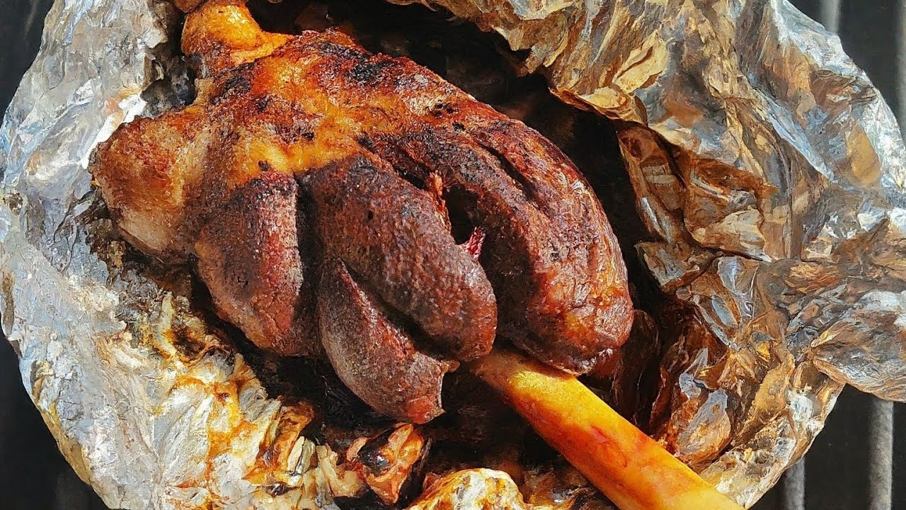 Lamb Shank wrapped in Aluminum foil paper and roasted on charcoal Grill | War4u tv