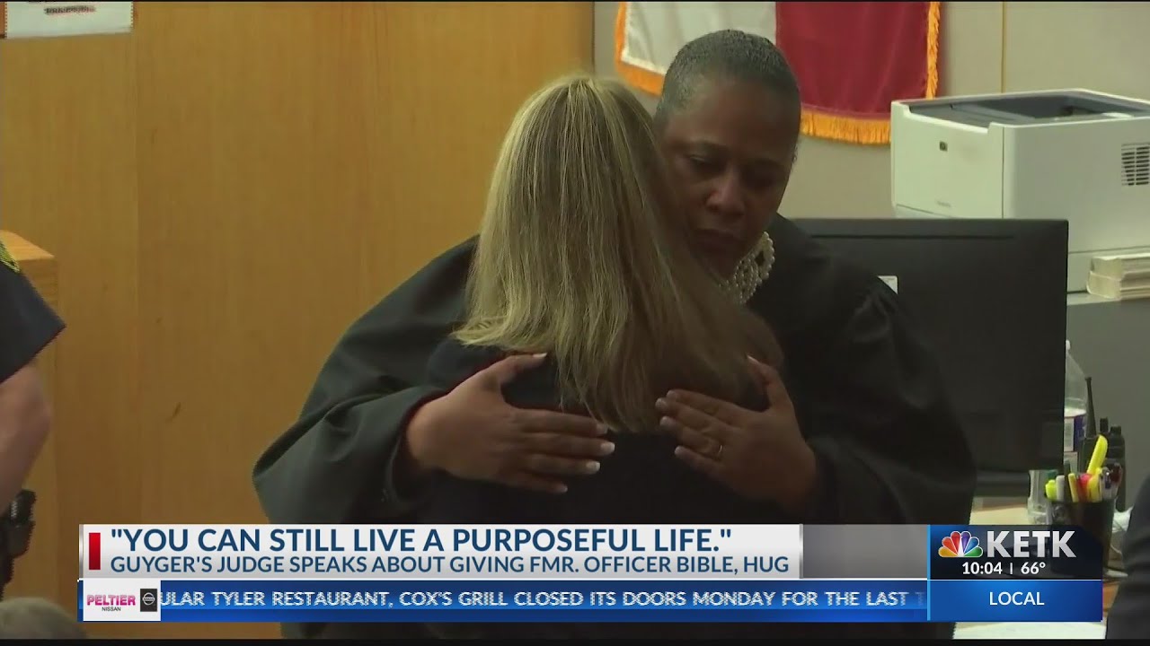 Judge in Amber Guyger case defends hugging her in court