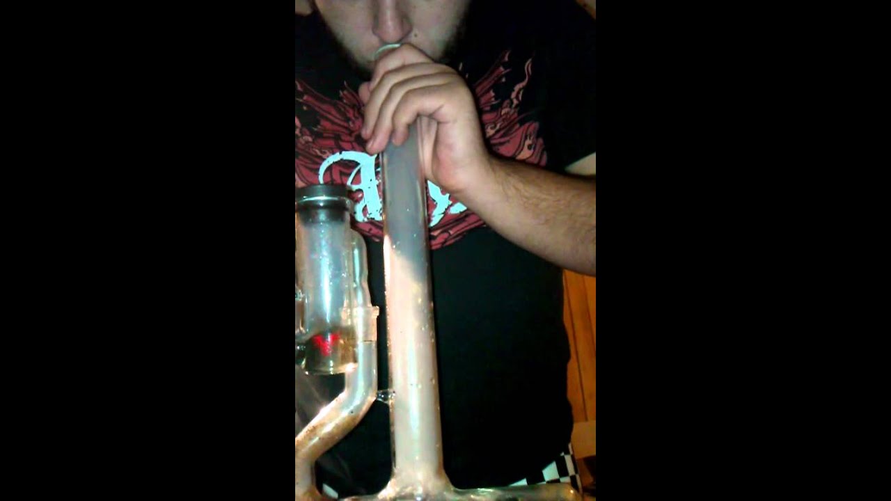 Hitting the inline wubbler with my new rubber stopper ashcatcher.