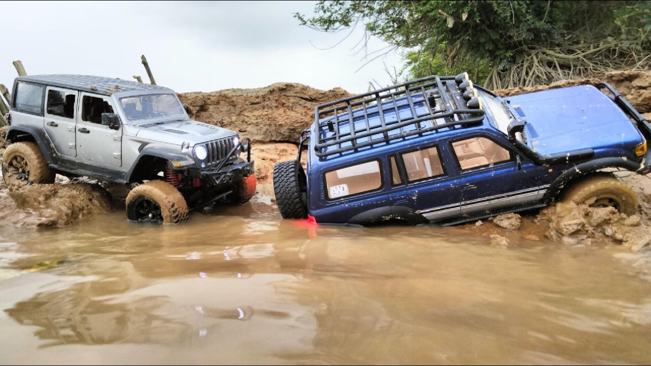Extreme RC Cars Off-Road | MN128 Jeep Rubicon vs LC80 Deep Mud Rescue Challenge