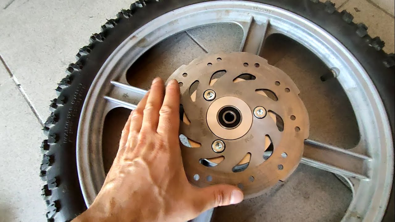 [Tutorial] Eliminare gioco mozzo a disco su cerchio in lega Piaggio Bravo, Ciao, Sì, ecc (montaggio)