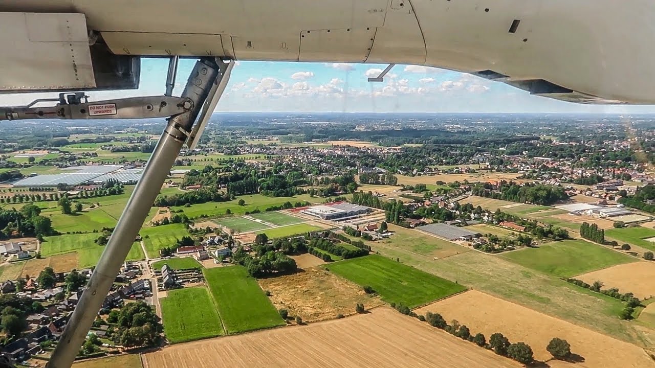 VLM Airlines Fokker 50 WINDY LANDING at Antwerp Airport (ANR)