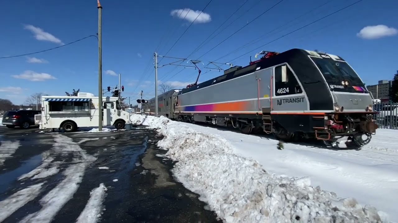 Two NJ Transit trains at Shrewsbury Avenue in Red Bank NJ