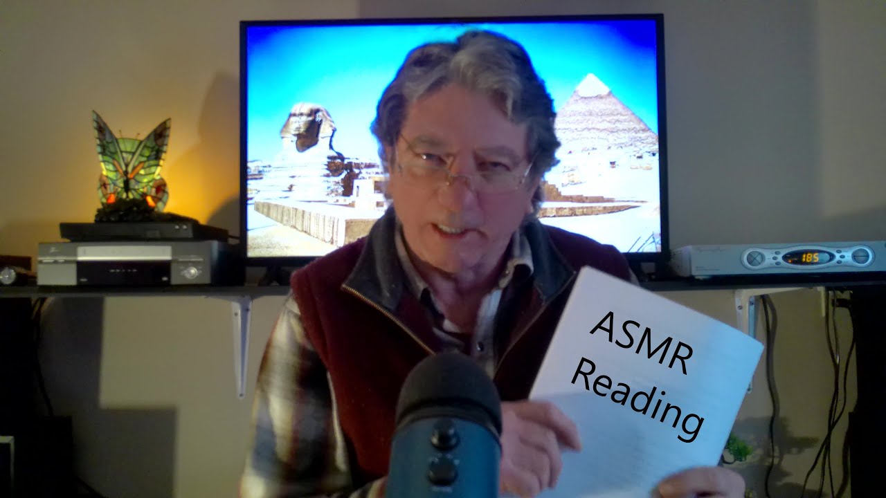 ASMR Reading the Unexplained Pyramids  .  Whispers and soft page triggers.