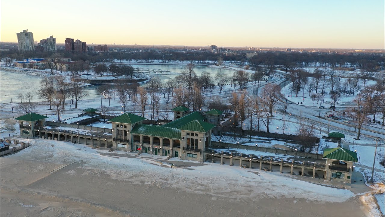 Drone View Of 63rd Street Beach House At Sunrise - Snowy Chicago Lakefront
