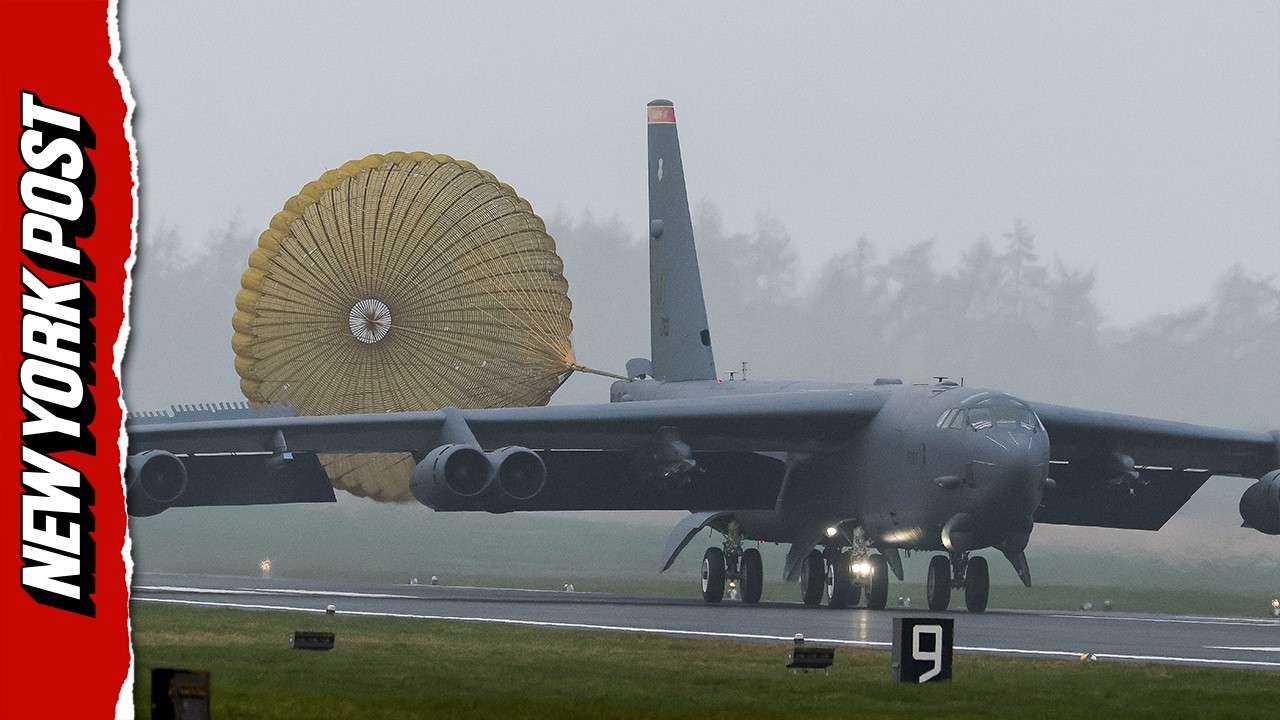 Massive B-52 bomber plane uses parachute for landing at UK air base