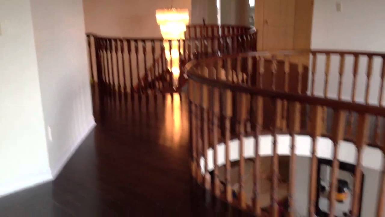 Floorama Flooring: Dark Red Oak Hardwood Flooring with Curved Nosings - Toronto