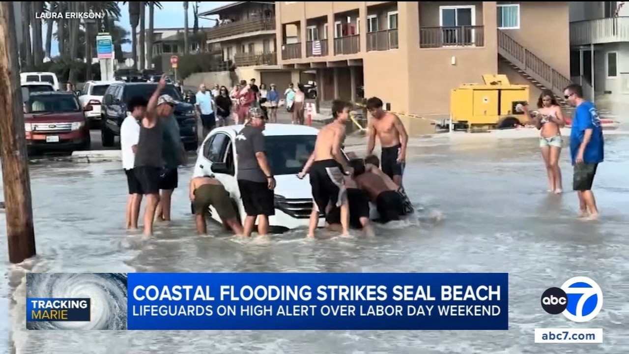 High surf from Hurricane Marie floods Seal Beach, fuels dangerous rip currents