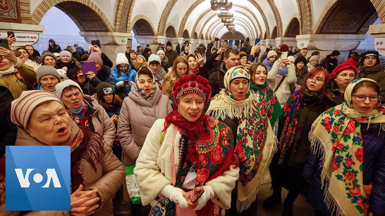 Ukrainians Sing Christmas Carols in Metro While Air Raid Sirens Sound in Kyiv