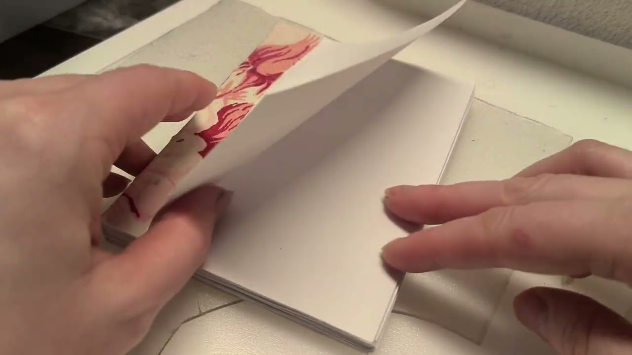 Attaching a cover to a notebook