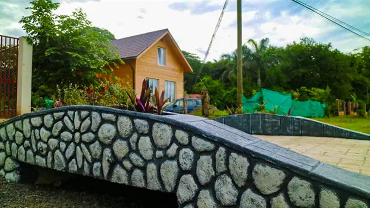 Made a bridge from cement for a car to a house DIY