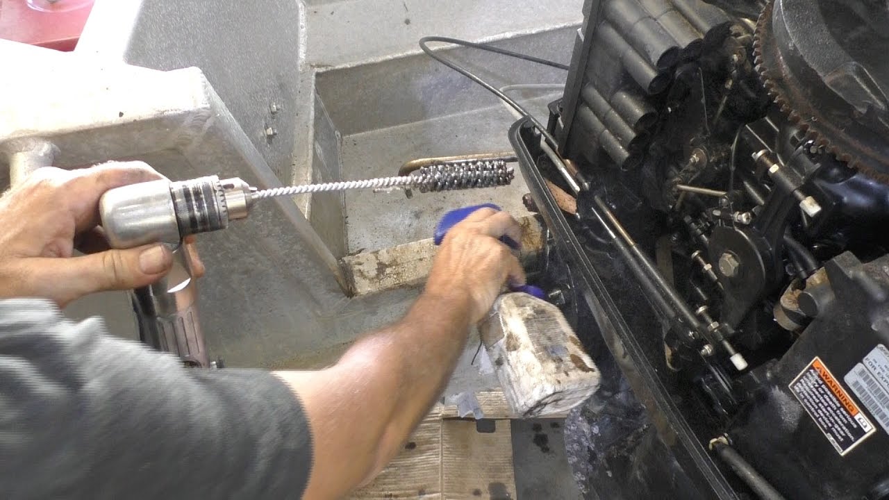 Cleaning an outboard tilt tube