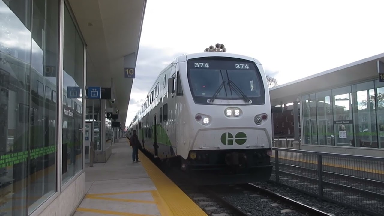 GO Transit Cab Car 374 and MP40PH Locomotive 679 arriving and departing Mt Dennis Station