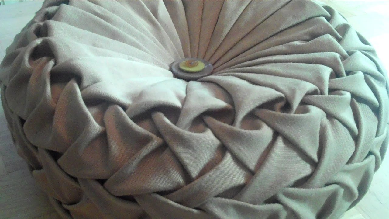 Canadian smocking/capitone round cushion by Debbie Shore. Matrix design.
