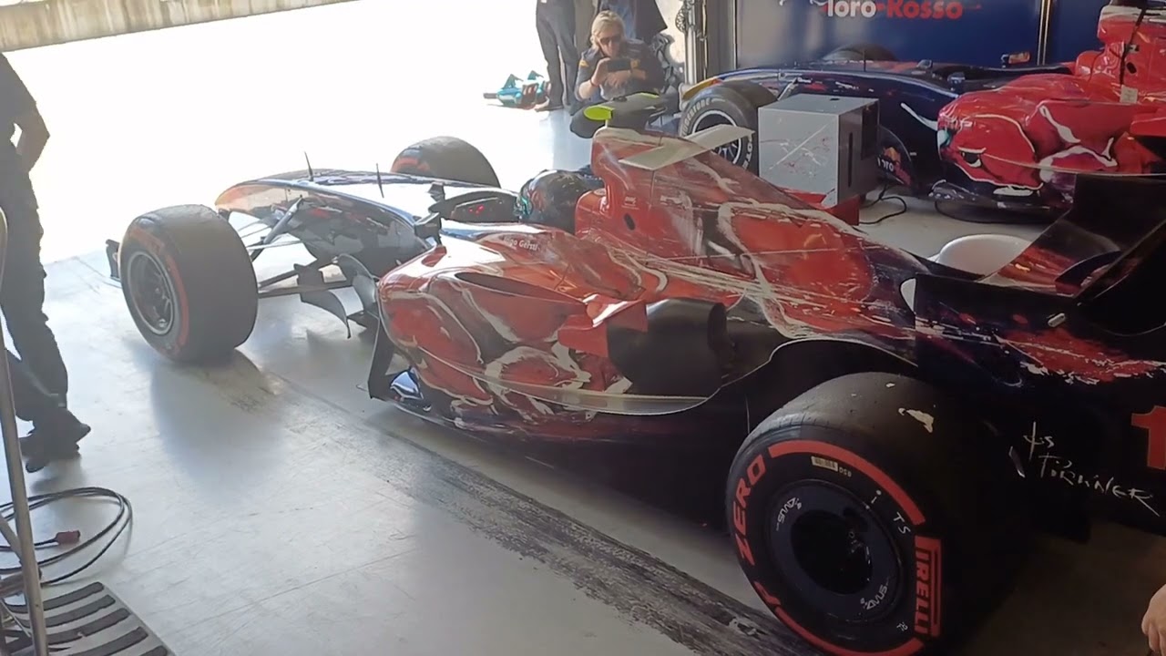 F1 V10 Drifts out of Pit Garage