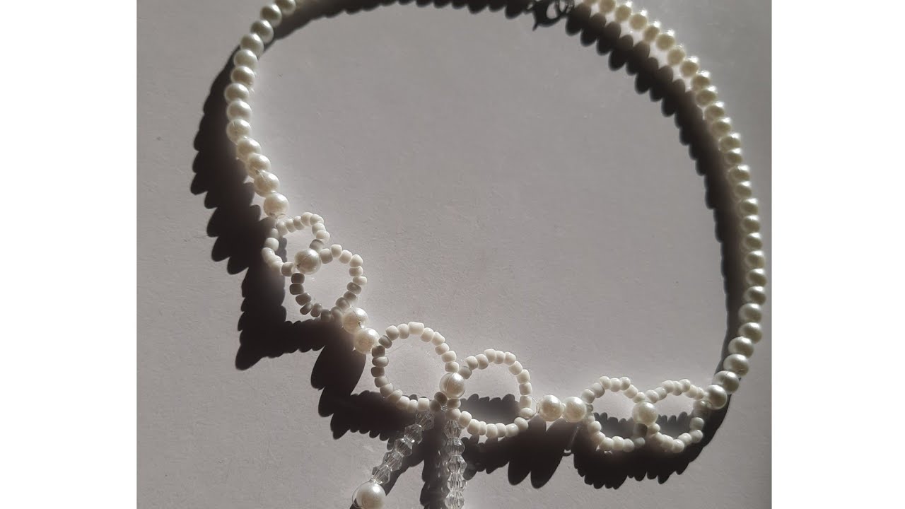 Making bow tie necklace with Pearl and nut