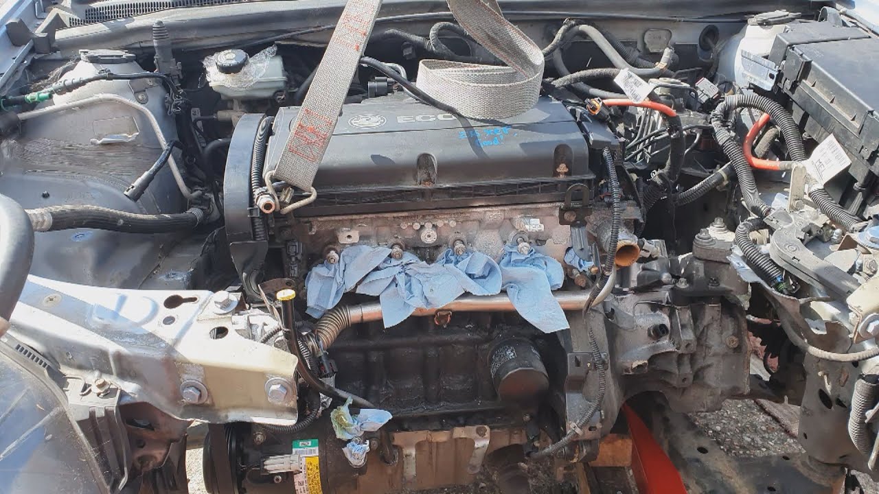 Astra H 1.6 engine replacement fitting the engine back in the car