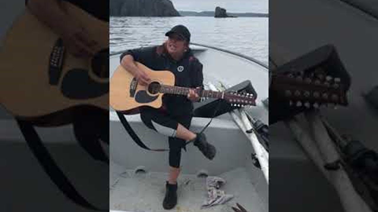 Whales Come Close to Boaters Singing and Playing Guitar || ViralHog