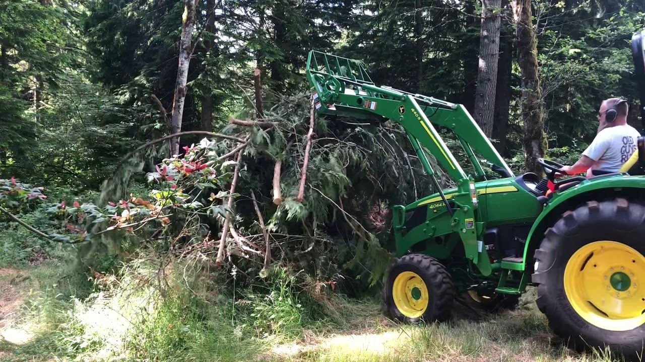 Tractor logging with a 2018 John Deere 4044R with forks