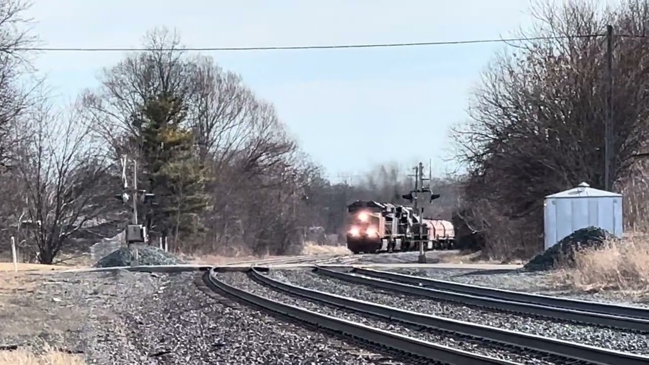Westbound NS Manifest  13Q with a UP leader and the rocky Mountaineer trail