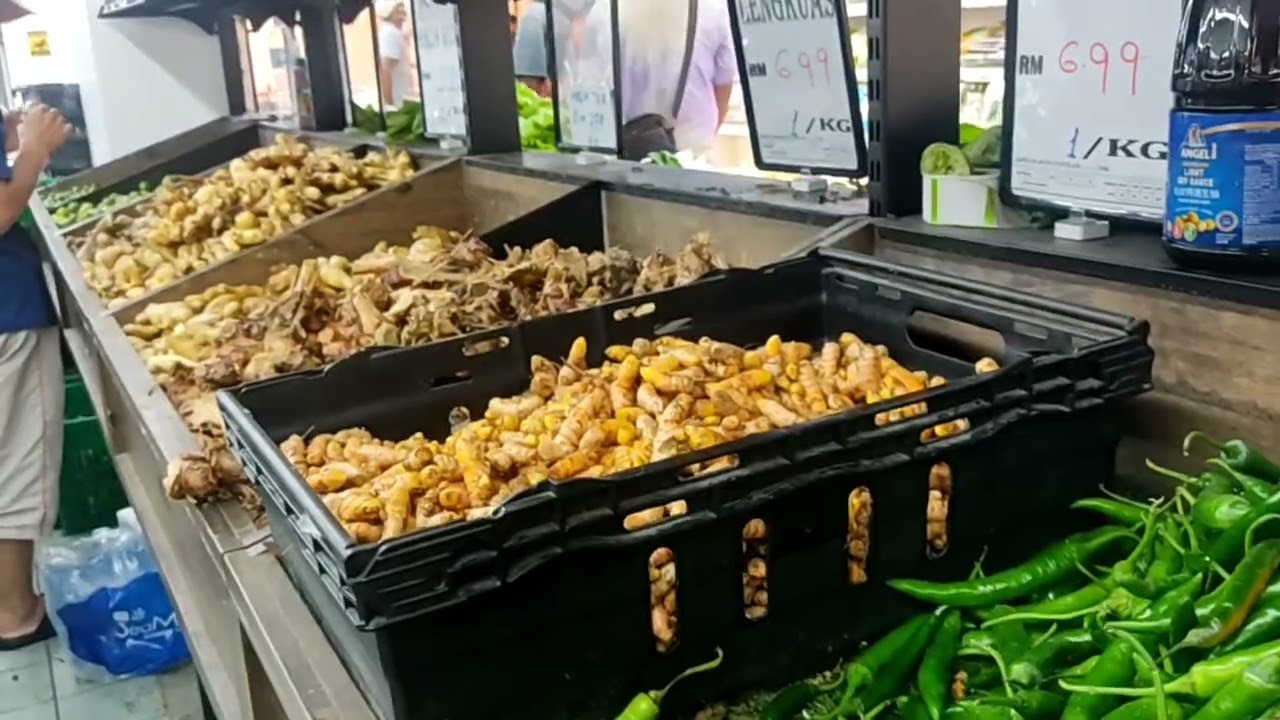 supermarket shopping vegetables different price  some item increased because of Malaysia economic