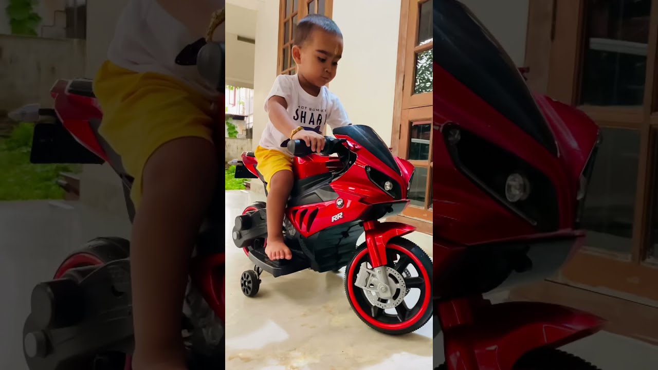 Battery Operated Ride on Bike RR with Hand Accelerator and Foot Brake and Lights - Rechargeable