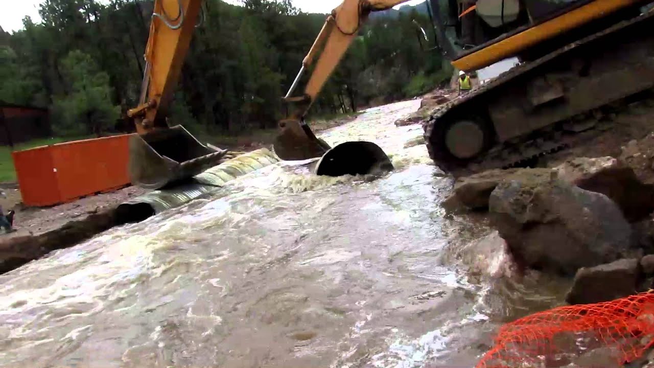 Attempt to replace culverts in flooded river 5/9/15