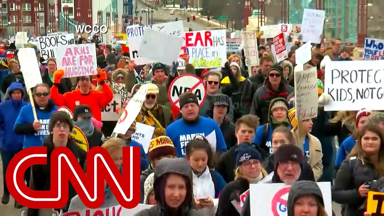 Massive crowds rally coast to coast to demand gun control