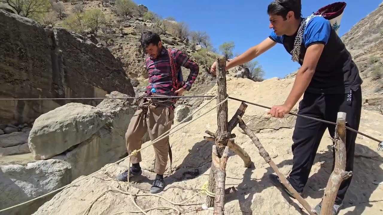 The extraordinary journey of Atabak and Muhammad across the river to bring materials