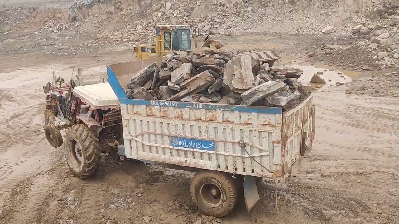 Biggest Trolley Stone Loading With Caterpillar Loadar in Mountain #stonecrusher 