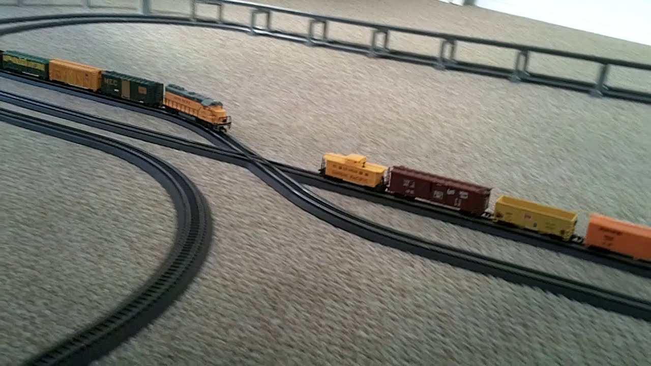 V25 Model Power, Life Like and Bachmann trains on power loc & e-z track with a 30 degree crossing