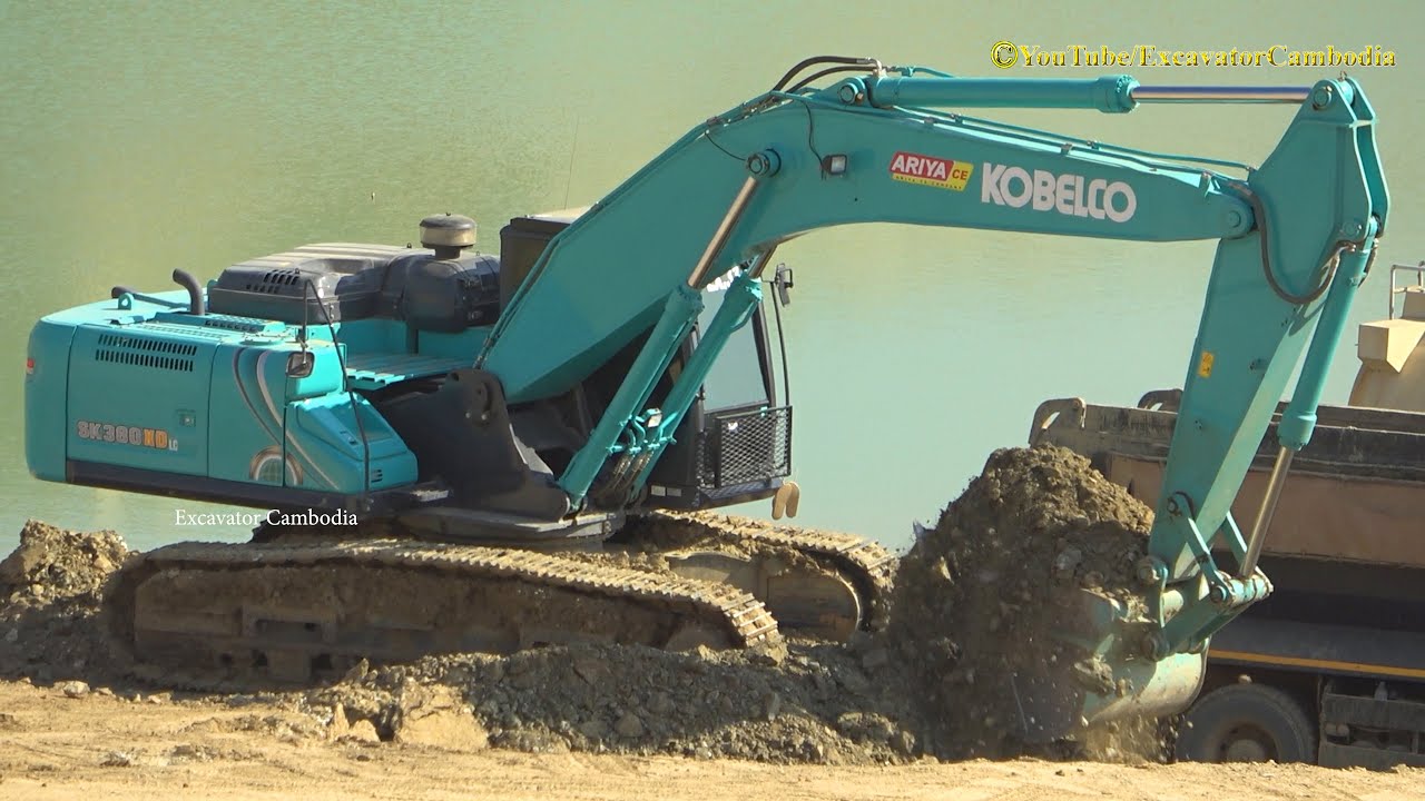 Amazing Powerfully Kobelco SK 380 Excavator Digging Rock Loading Dump Trucks