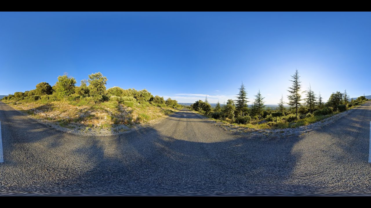 360° STOCK VIDEO 4K | Lonely Road Leading To And Flanked By Forested Hills | Atmosphaeres