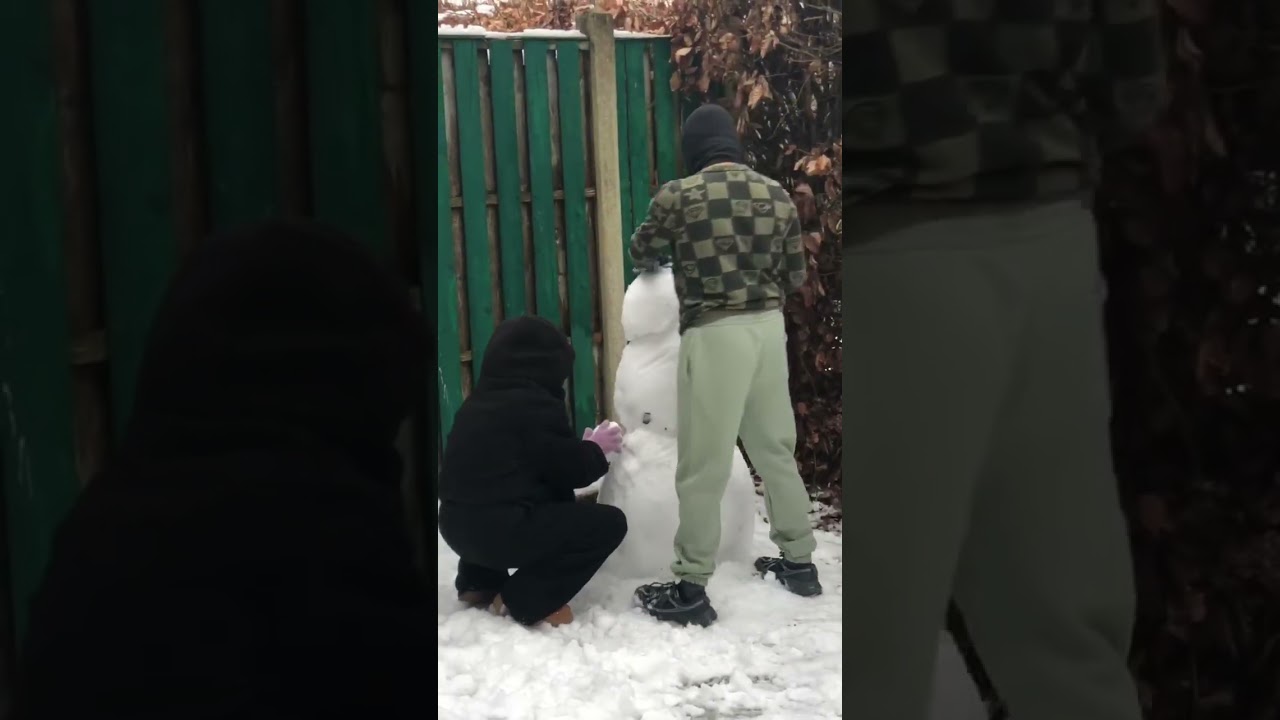 My Niece &  nephew make a snowman 