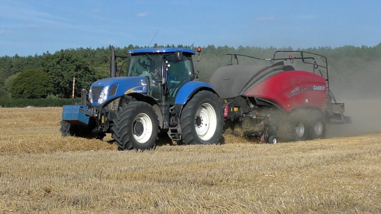 New Holland T7050 Barking Away with Case LB424 Square Baler