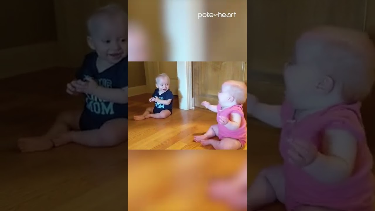 Twin Babies Laugh Uncontrollably Looking at Each Other