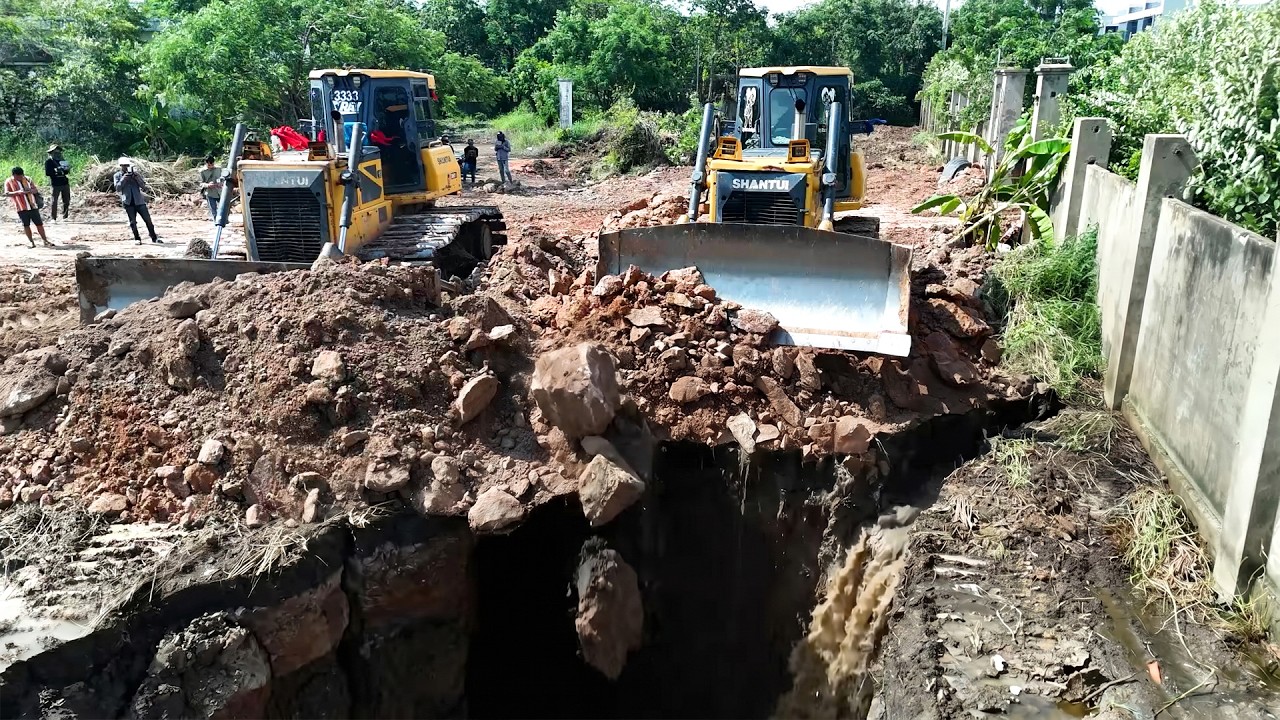 Amazing Landfill Task Using Shantui Dozer Push Stone into Flood Block with Dump Truck