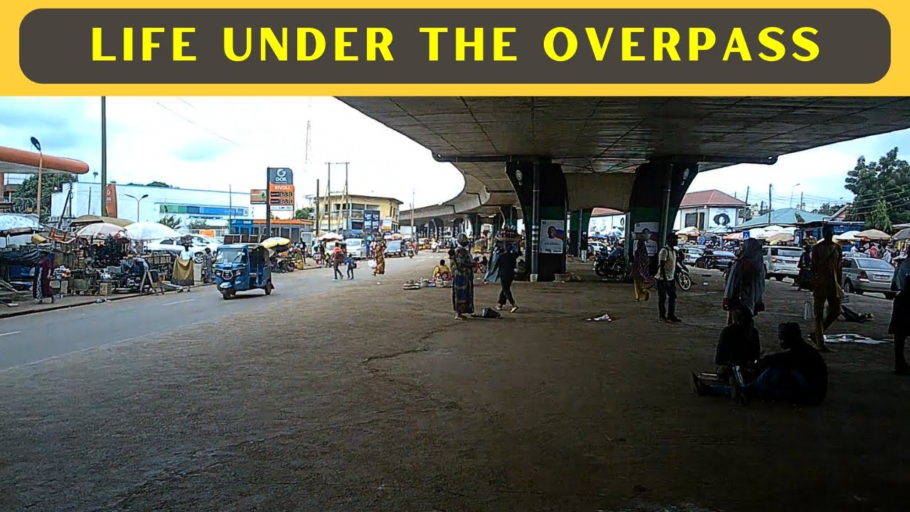 WALKING Tour of Downtown Tamale, Ghana + Rain + a Little Market Walk - Life Under the Overpass
