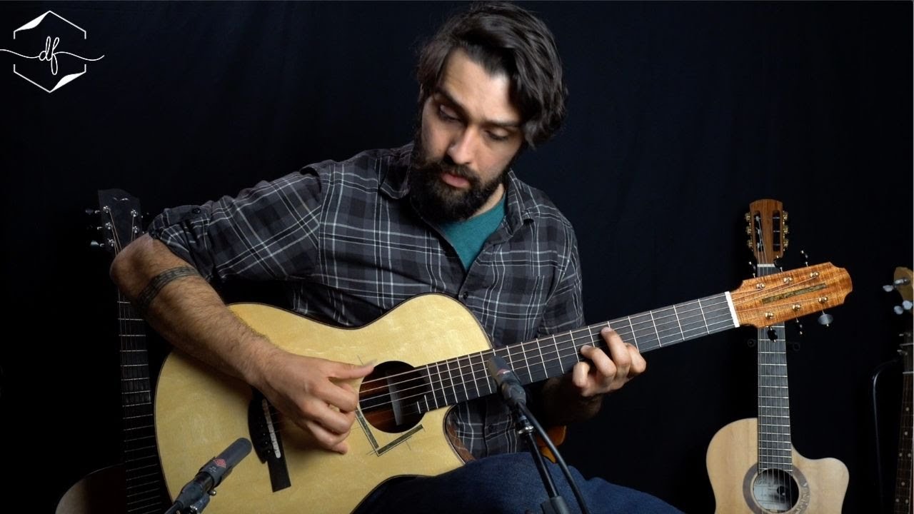 Dustin Furlow plays a Spohn 00 12-fret (Swiss Moon/Tasmanian Blackwood)