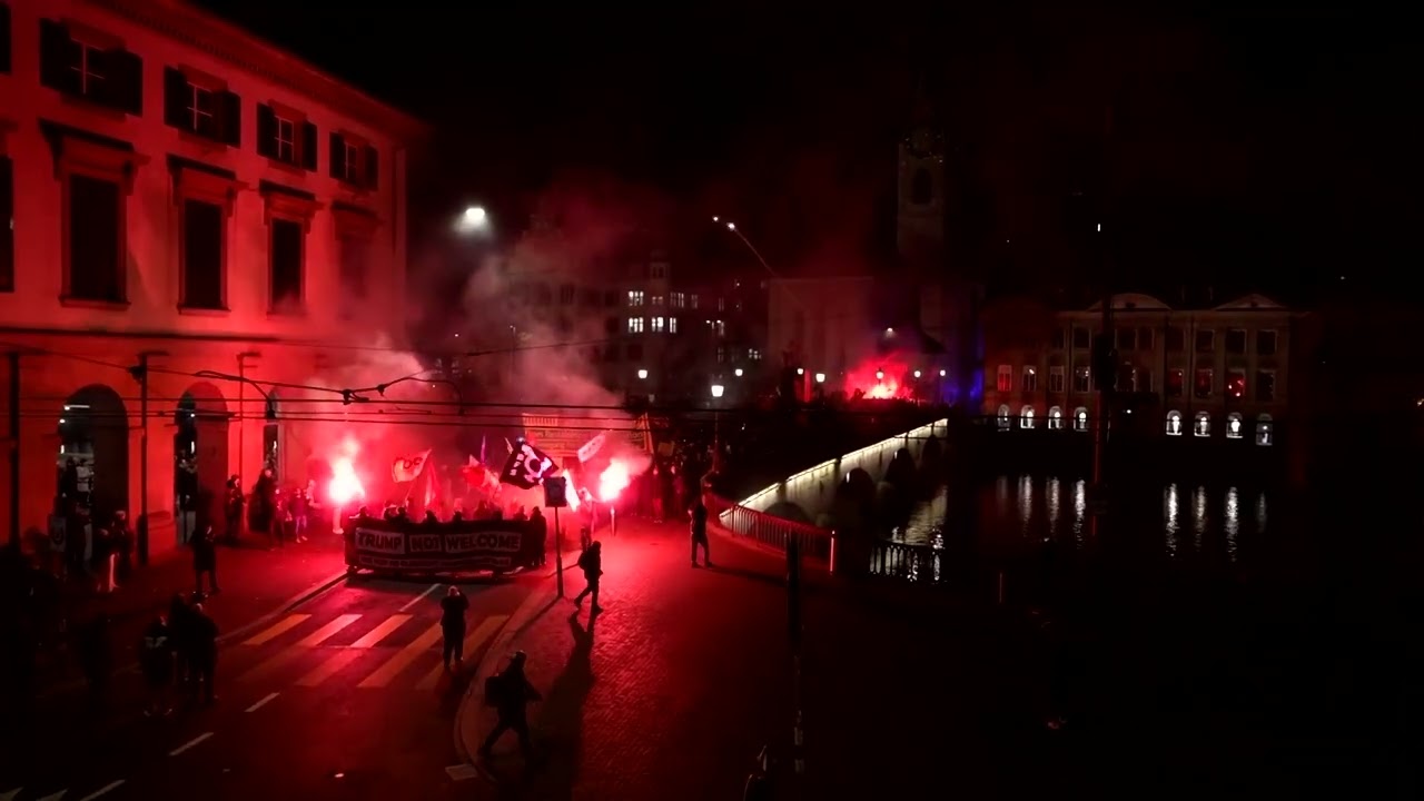 Zurich police deploy water cannon against Trump and WEF protesters | REUTERS