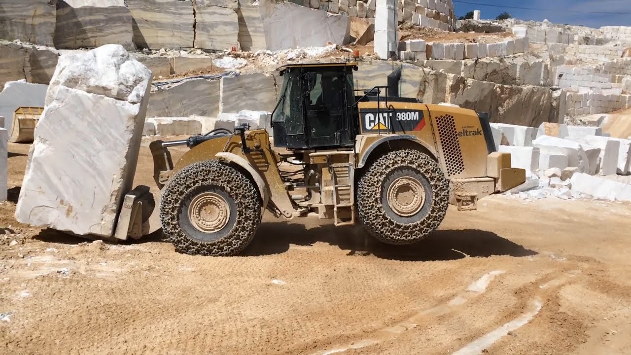 Caterpillar 980M And Caterpillar 980H Wheel Loaders Working On Marble Quarries