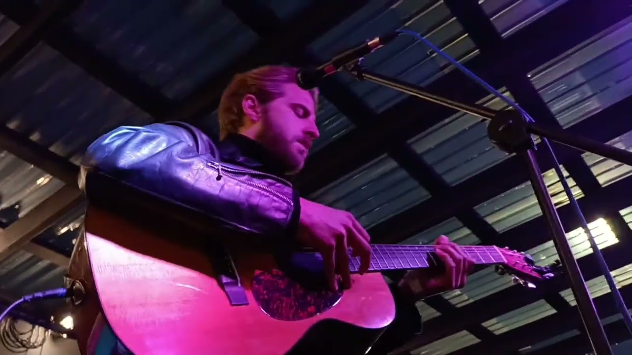 Christian Lee Hutson live at Future Yard festival, singing in a storm 