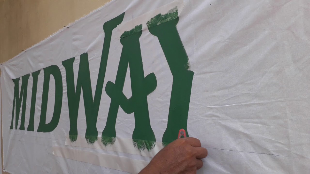 pintando faixa em tecido