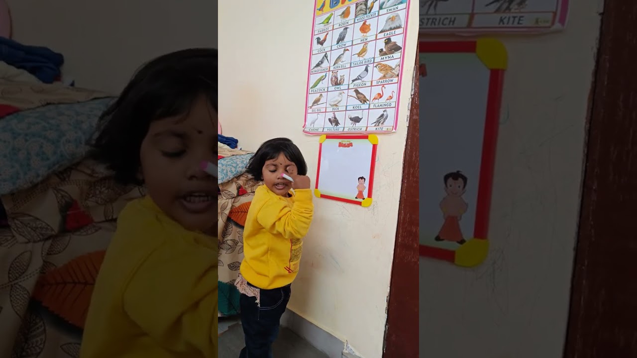 So cute teacher teaching fruits, animals name on white board 