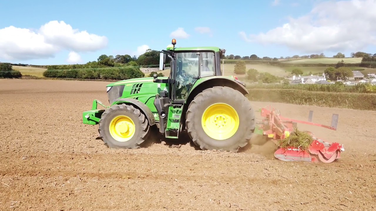 John Deere 6195M and Kuhn HR 4004 power harrow