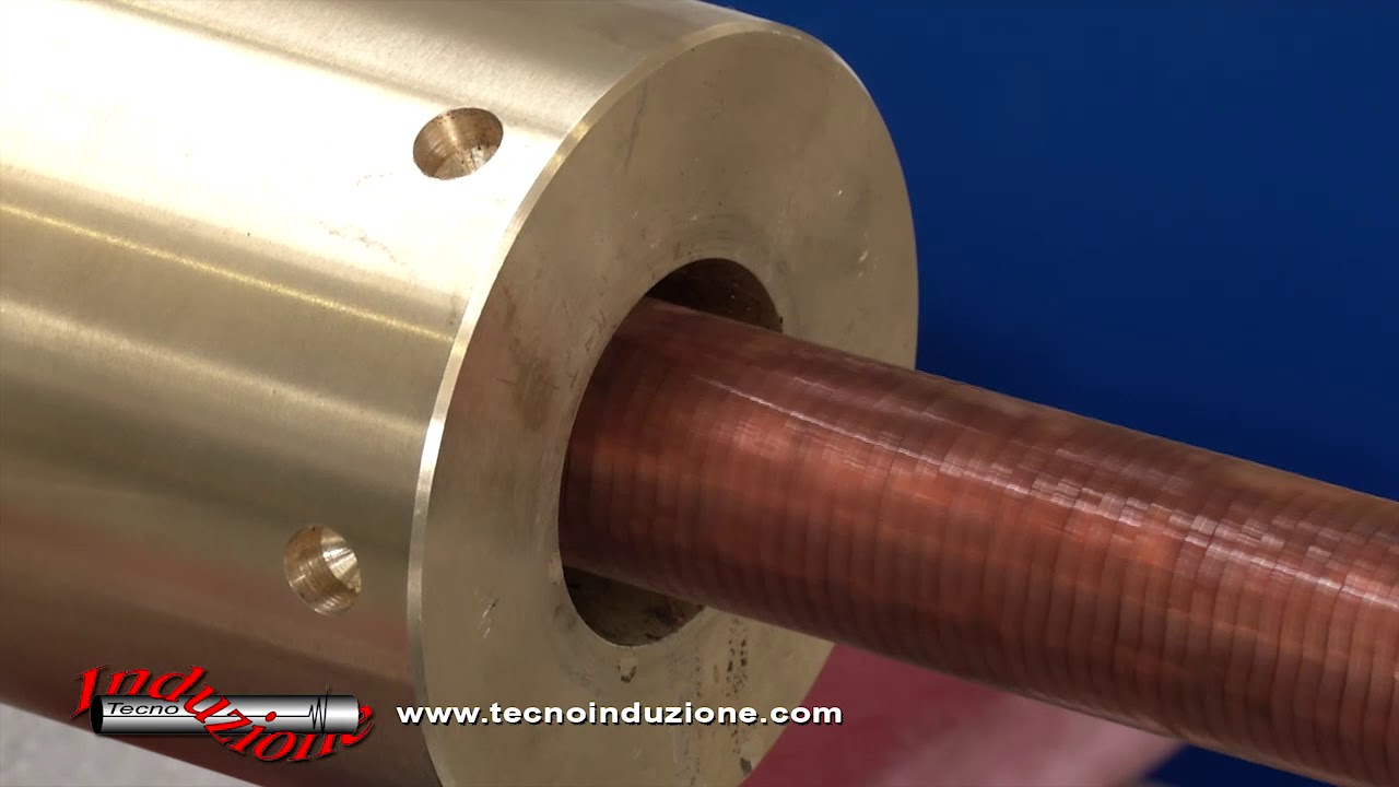 INDUCTION ANNEALING OF FINNED COPPER TUBING