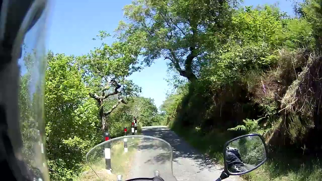 Suzuki V-Strom 650 on a country lane near Beddgelert - views of Snowdonia Eryri