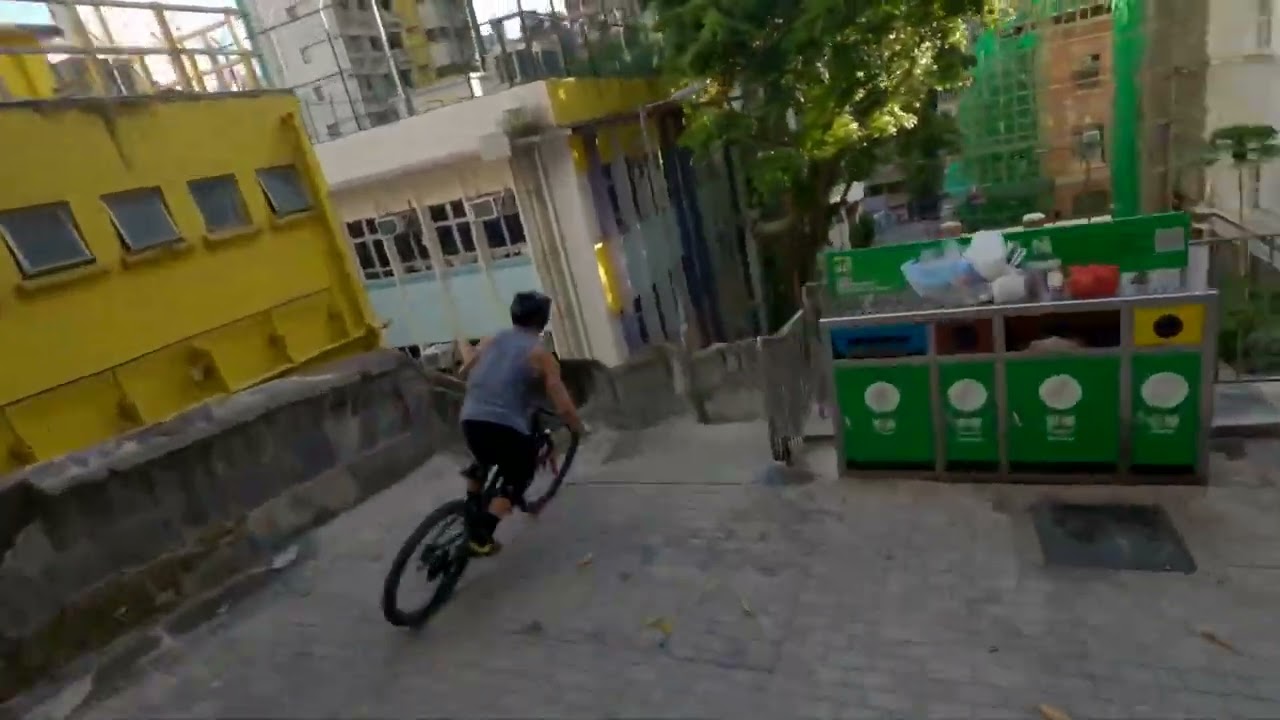 FPV Drone Pilot Rides Mountain Bike Across Streets Of Hong Kong - 1350865